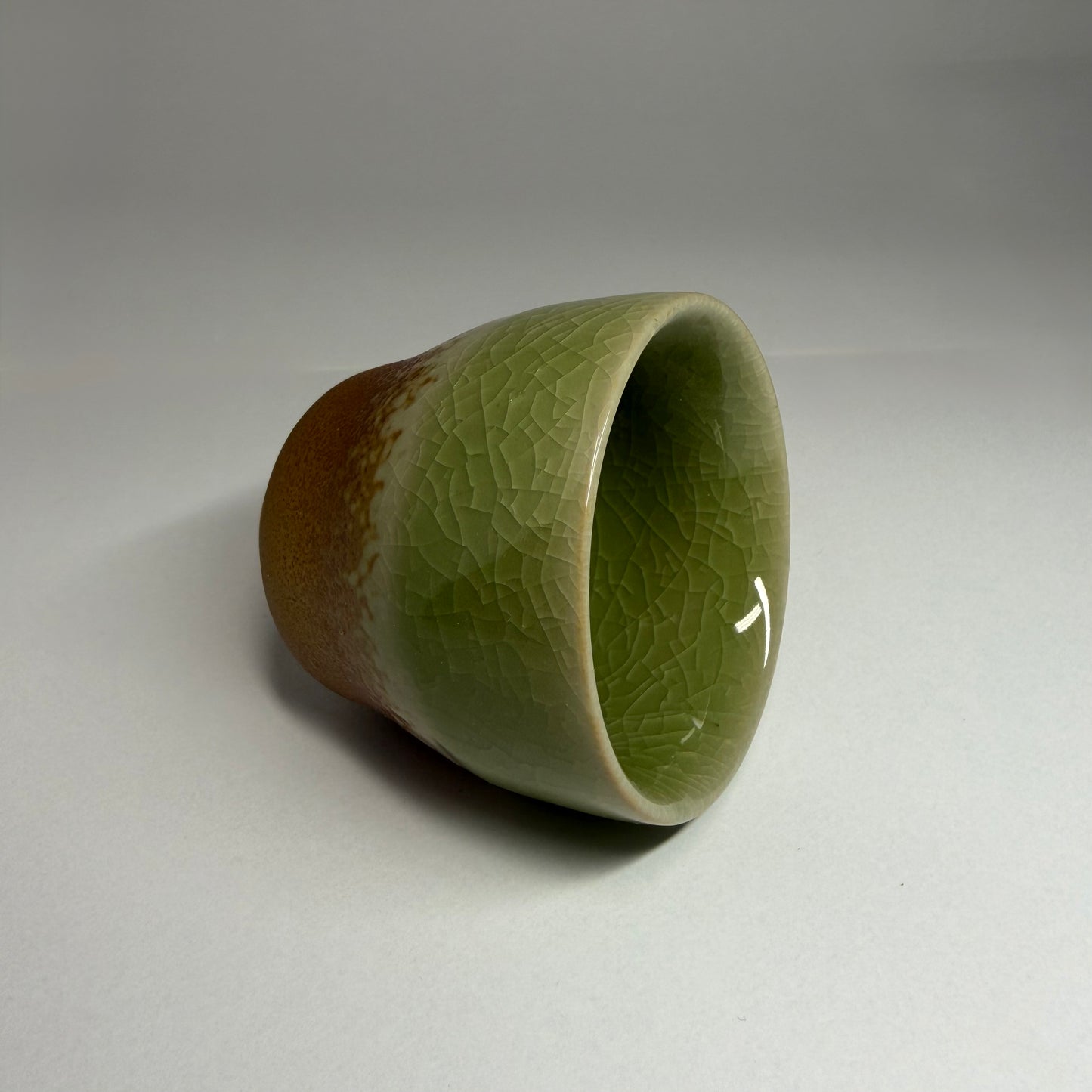 Side view of Sei Cup – Tall showing vertical form and natural crackle glaze ceramic