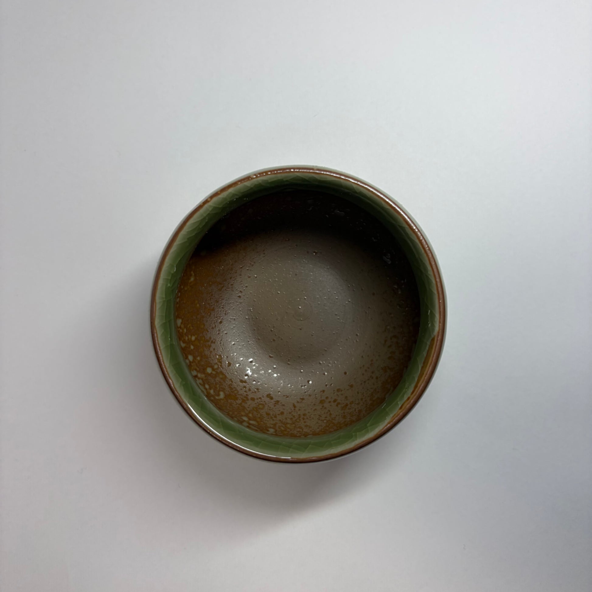 Top view of Sei Cup – Round handmade ceramic tea bowl with crackle glaze interior